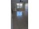 Large tile flooring in the living room with natural light at 1617 Shady Ridge Ct # 257, Orlando, FL 32807