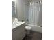 Modern bathroom featuring a shower and tub combination with a single sink vanity at 207 Aidans Lndg, Haines City, FL 33844