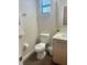 Cozy half bathroom with granite countertop, stylish vanity and fixtures at 207 Aidans Lndg, Haines City, FL 33844