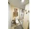 A clean bathroom featuring a toilet and an enclosed glass shower, providing a functional space at 207 Jacaranda Dr, Leesburg, FL 34748