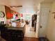 Bright kitchen with wood cabinets, stainless appliances, and an eat-in dining area at 207 Jacaranda Dr, Leesburg, FL 34748