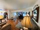 Bright and airy living room seamlessly connected to the adjacent kitchen area at 207 Jacaranda Dr, Leesburg, FL 34748