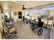 View of the enclosed, well-lit porch offering a place to enjoy the outdoors at 207 Jacaranda Dr, Leesburg, FL 34748