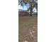 The property features a large backyard, ideal for outdoor activities and enjoying nature at 225 E Cummings St, Lake Alfred, FL 33850