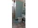 This bathroom features a tiled shower, toilet and sink, along with coordinated accessories at 225 E Cummings St, Lake Alfred, FL 33850