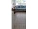 Relaxing sun room filled with natural light and cozy seating, perfect for enjoying peaceful moments at 225 E Cummings St, Lake Alfred, FL 33850
