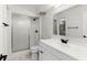 Bathroom with a shower, a toilet, and a vanity with modern fixtures at 2449 E Lake Dr, Deland, FL 32724