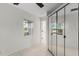 Bedroom with large mirrored closet doors at 2449 E Lake Dr, Deland, FL 32724