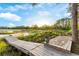 Wooden dock on a lake provides an excellent place for fishing and quiet relaxation at 2449 E Lake Dr, Deland, FL 32724