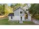 Home's exterior with new landscaping and spacious front yard at 2449 E Lake Dr, Deland, FL 32724