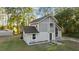 Home's exterior with new landscaping and spacious surrounding grounds at 2449 E Lake Dr, Deland, FL 32724