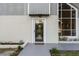 Up close shot of front door and new garden bed at 2449 E Lake Dr, Deland, FL 32724