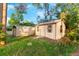 This shed provides additional storage space and utility at 2449 E Lake Dr, Deland, FL 32724