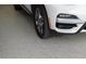 Garage floor with an epoxy coating and a white SUV is parked in the garage at 25879 Crossings Bluff Ln, Sorrento, FL 32776