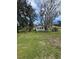 Quaint home with a well-maintained yard and mature trees at 309 Old Mission Rd, New Smyrna Beach, FL 32168