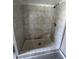 Close up of new, tiled shower at 309 Old Mission Rd, New Smyrna Beach, FL 32168