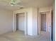 Bedroom featuring ceiling fan and closet space at 3623 Eversholt St, Clermont, FL 34711