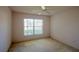 Bedroom view showing a window providing natural light at 3623 Eversholt St, Clermont, FL 34711