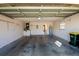 This garage features a bright interior with ample space for parking at 3623 Eversholt St, Clermont, FL 34711