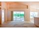 Bright living room featuring sliding glass doors to the patio at 3623 Eversholt St, Clermont, FL 34711