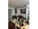 Kitchen with granite countertop and adjacent dining area at 5112 Conroy Rd # 17, Orlando, FL 32811