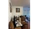 Casual living room with a small kitchen appliance and open access to the living spaces, perfect for entertaining at 5112 Conroy Rd # 17, Orlando, FL 32811