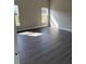 Bright, light-filled bedroom with hardwood floors, recessed lighting, and neutral walls at 620 N 2Nd N St, Lake Hamilton, FL 33851
