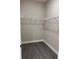 Empty walk-in closet features neutral paint, white trim, and wire shelving at 620 N 2Nd N St, Lake Hamilton, FL 33851