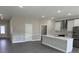 Spacious open-concept living area with sight lines to the kitchen and ample natural light at 620 N 2Nd N St, Lake Hamilton, FL 33851