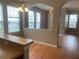 Open dining area featuring hardwood floors with view to living room at 7117 Red Lantern Dr # 7117, Harmony, FL 34773