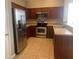 Modern kitchen featuring stainless steel appliances and ample counter space at 7117 Red Lantern Dr # 7117, Harmony, FL 34773