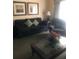 Inviting living area featuring comfortable furniture and natural light, creating a relaxing ambiance at 7697 Heritage Crossing Way # 302, Reunion, FL 34747