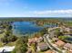 The aerial view of the houses in the community and the surrounding lakes at 800 Stephens Pass Cv, Lake Mary, FL 32746