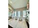 Bright play room with vaulted ceiling, custom bookshelves, and charming decor at 800 Stephens Pass Cv, Lake Mary, FL 32746