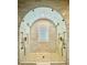 Luxurious arched shower with dual shower heads, stone floor, and frosted glass door at 800 Stephens Pass Cv, Lake Mary, FL 32746