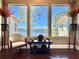 Stunning water view framed by large windows, highlighting the home's serene setting at 800 Stephens Pass Cv, Lake Mary, FL 32746