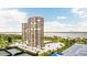 Stunning aerial view of waterfront high-rise condos, showcasing architecture and surrounding landscape at 1 Oceans West Blvd # 3B4, Daytona Beach, FL 32118