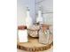 Close-up of kitchen décor featuring ceramic containers and wooden accents at 1 Oceans West Blvd # 3B4, Daytona Beach, FL 32118