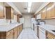 Functional kitchen with plentiful counterspace and cabinets at 1 Oceans West Blvd # 3B4, Daytona Beach, FL 32118