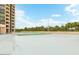 Outdoor area with lounging chairs, synthetic grass, and views at 1 Oceans West Blvd # 3B4, Daytona Beach, FL 32118