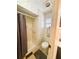 Bathroom with a shower stall, toilet, and small window at 123 Pyracantha Ln, Leesburg, FL 34748