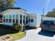Charming single-story home with well-manicured lawn, ample parking, and close to street at 123 Pyracantha Ln, Leesburg, FL 34748