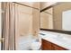 Bathroom featuring shower-tub combo with tile surround, and a single vanity at 1333 Darnaby Way, Orlando, FL 32824