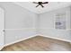 Cozy bedroom featuring neutral color palette and bright window at 1333 Darnaby Way, Orlando, FL 32824