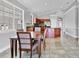 Bright dining area with a table and chairs, adjacent to the kitchen and living spaces at 1333 Darnaby Way, Orlando, FL 32824
