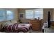 Cozy bedroom with natural light and traditional decor at 1540 Avenue C Ne, Winter Haven, FL 33881