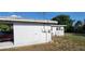 Exterior showcasing the side and rear of the property at 1540 Avenue C Ne, Winter Haven, FL 33881