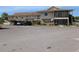 Beige two-story condo with covered parking and screened porch at 1640 Juno Trl # 101A, Astor, FL 32102