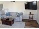 Comfortable living room with plush seating, stylish decor, and a cozy atmosphere at 1640 Juno Trl # 101A, Astor, FL 32102