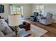 Relaxing living room featuring a slider to outside and views of the lanai at 1640 Juno Trl # 101A, Astor, FL 32102
